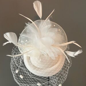 Elegant White Fascinator with Feathers